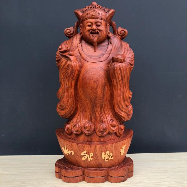 Tượng thần tài đặt phòng khách với mong muốn rước lộc vào nhà